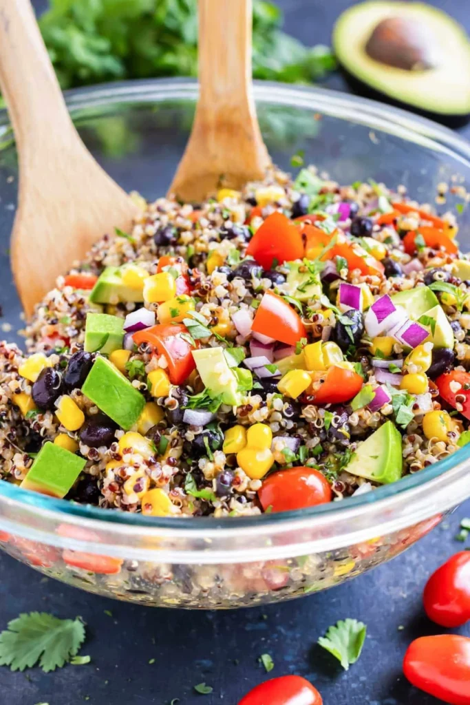 Mexican quinoa salad topped with cilantro and lime dressing