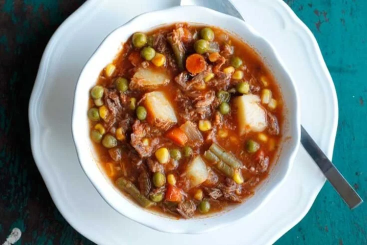 Bowl of my mom's old-fashioned vegetable beef soup with fresh ingredients