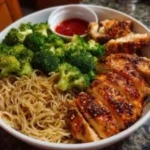 Delicious Spicy Garlic Chicken and Broccoli Noodle Bowl